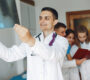 doctor holds x ray patient 90x80