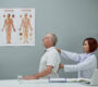 chiropractor checking spine 90x80